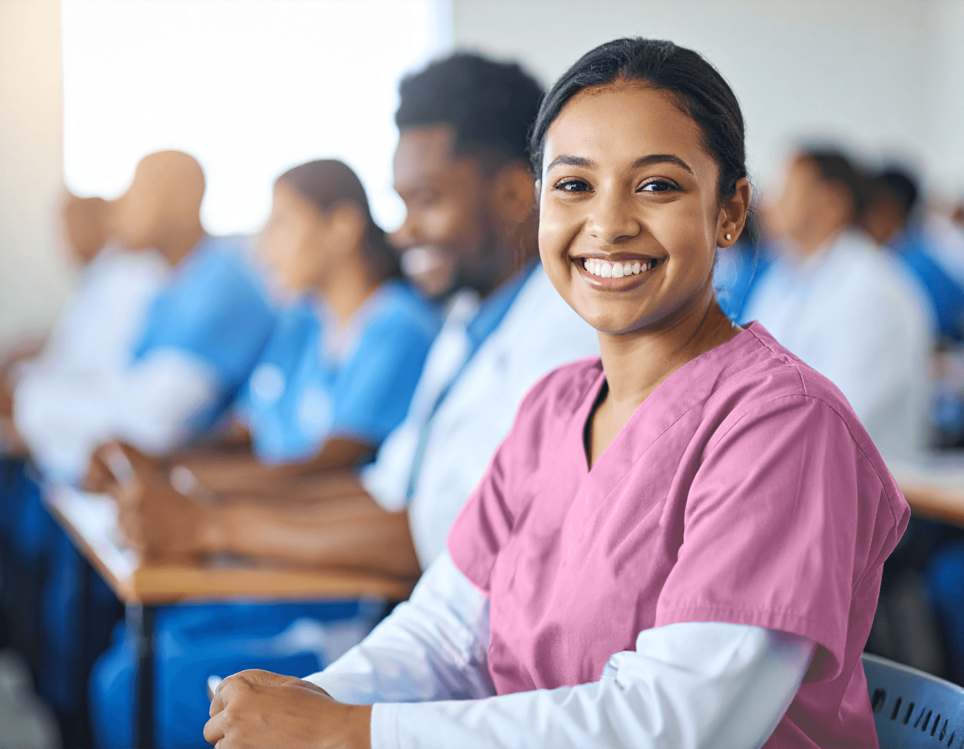 Healthcare student smiling in a classroom